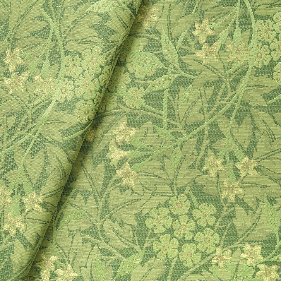生地拡大画像／植物の葉のシルエットを繊細なラインで描いた上にジャスミンを重ねることで、二種類の植物の重なりが奥行きを感じさせるデザインです