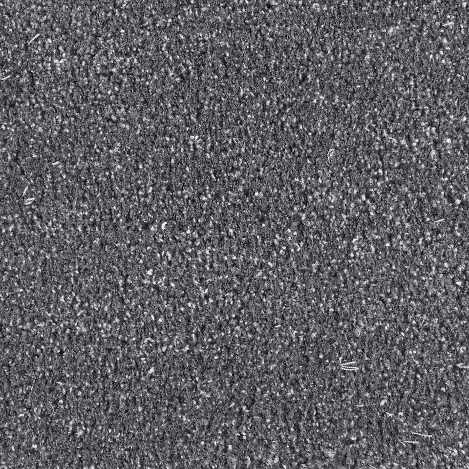 太陽が沈む一瞬の残光を、繊細で光沢のある糸とウールで表現したラグです／カラー：グレー