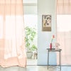 イメージ画像／オレンジのやさしい色合いが差し込む光をほんのりと色づけ、夕焼けのようなあたたかな雰囲気をお部屋に添えるカラーレースカーテンです